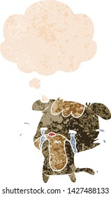 cartoon sad dog with thought bubble in grunge distressed retro textured style