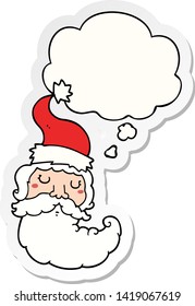 cartoon santa face with thought bubble as a printed sticker