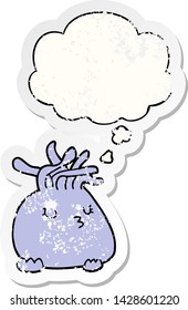 cartoon sea anemone with thought bubble as a distressed worn sticker