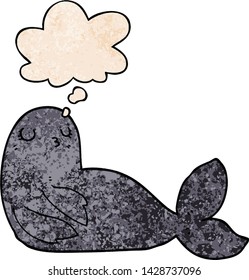 cartoon seal with thought bubble in grunge texture style