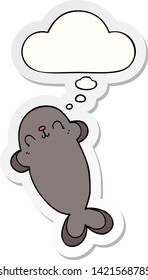 cartoon seal with thought bubble as a printed sticker