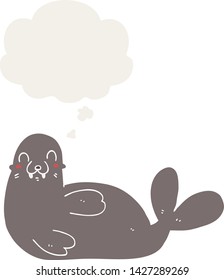 cartoon seal with thought bubble in retro style