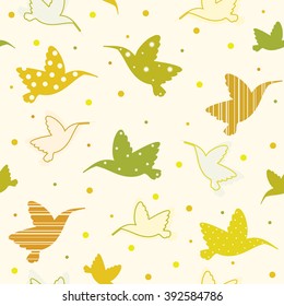 Cartoon seamless pattern with colored hummingbird. Vector wallpaper with birds. 