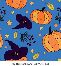 Cartoon seamless pattern of funny pumpkins in hats with stars on a blue background.