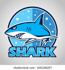 Cartoon shark mascot with blue circle