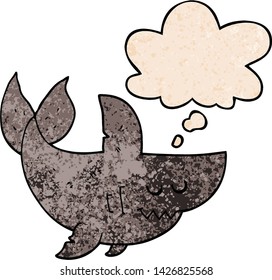 cartoon shark with thought bubble in grunge texture style