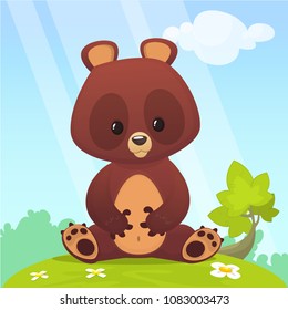Cartoon small baby bear sitting in the green summer meadow Vector illustration