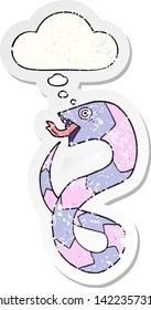 cartoon snake with thought bubble as a distressed worn sticker