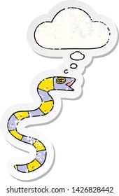 cartoon snake with thought bubble as a distressed worn sticker