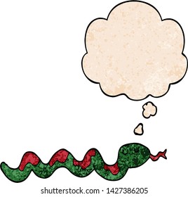 cartoon snake with thought bubble in grunge texture style