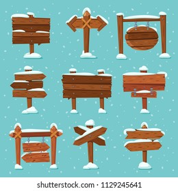 Cartoon snowed signpost. Christmas wooden signpost isolated with arrow snowcap old traffic sign billboard group. Arrows on snow and direction signs with ice icicles on top vector set