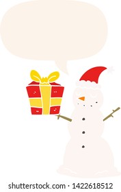 caricatura de muñeco de nieve con presente con burbuja de habla en estilo retro