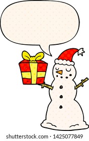 cartoon snowman with present with speech bubble in comic book style