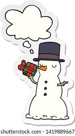 cartoon snowman with thought bubble as a printed sticker