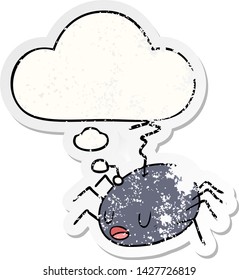 cartoon spider with thought bubble as a distressed worn sticker