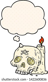 cartoon spooky skull and candle with thought bubble in comic book style