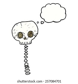 cartoon spooky skull and spine with thought bubble