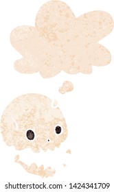 cartoon spooky skull with thought bubble in grunge distressed retro textured style