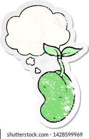 cartoon sprouting seed with thought bubble as a distressed worn sticker