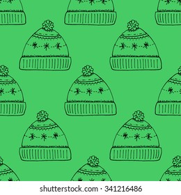 Cartoon Style Hand Drawn Winter Hat Seamless Pattern - Doodle Outline Stroke Illustrations on Green Background - Christmas and Holidays - Vector Illustration Graphic Resource