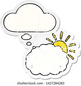 cartoon sun and cloud symbol with thought bubble as a distressed worn sticker