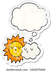 cartoon sun and cloud with thought bubble as a distressed worn sticker