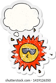 cartoon sun with thought bubble as a distressed worn sticker
