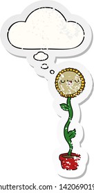 cartoon sunflower with thought bubble as a distressed worn sticker
