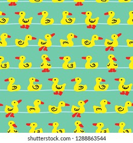 Cartoon of  swimming little ducklings seamless background pattern. Vector illustration. 