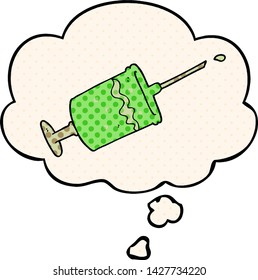 cartoon syringe needle with thought bubble in comic book style