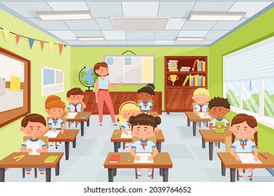 Cartoon Teacher With Pupils, School Kids Sitting At Desks In Classroom. Elementary School Children Studying In Class Vector Illustration. Children Having Geography Test Or Exam, Getting Knowledge