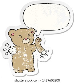 cartoon teddy bear with torn arm with speech bubble distressed distressed old sticker