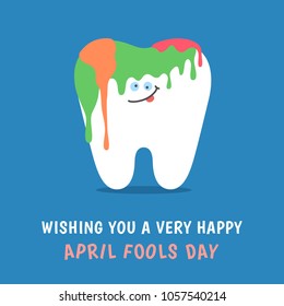 Cartoon tooth covered with paint. April Fools Day joke. Dental illustration isolated on blue background. Greeting card from dentistry.