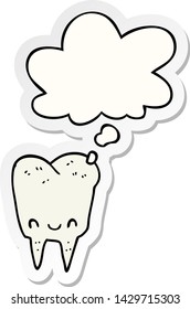 cartoon tooth with thought bubble as a printed sticker