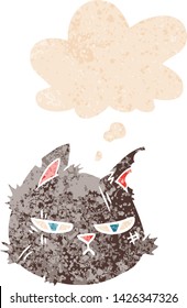 cartoon tough cat face with thought bubble in grunge distressed retro textured style