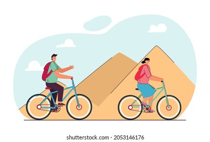 Cartoon tourist couple riding bicycles through desert. Man and woman in front of pyramids in Egypt flat vector illustration. Traveling, tourism, transportation concept for banner or landing web page