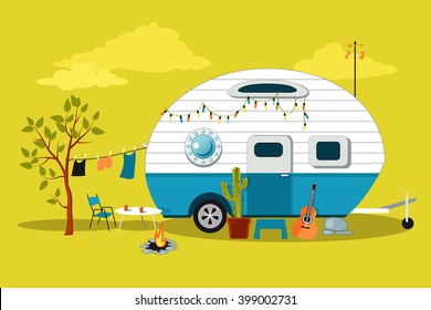 Cartoon traveling scene with a vintage camper, a fire pit, camping table and laundry line, EPS 8 vector illustration, no transparencies