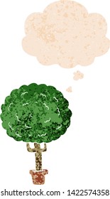 Karikaturenbaum mit Gedankenblase im brüchigen Retro-Stil