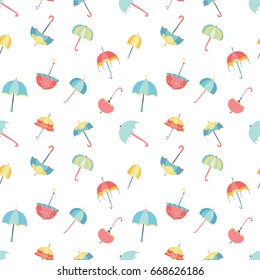 Cartoon umbrellas vector seamless pattern in pastel tones in red, yellow, blue and orange colors.