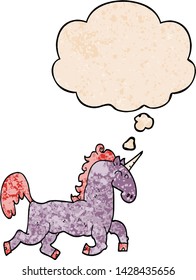 cartoon unicorn with thought bubble in grunge texture style