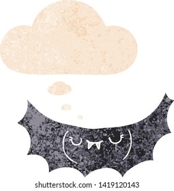Cartoon-Vampir-Fledermaus mit Gedankenblase in brüchiger Retro-strukturierter Form