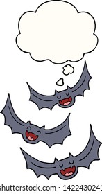 cartoon vampire bats with thought bubble