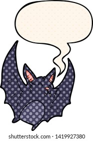 cartoon vampire halloween bat with speech bubble in comic book style
