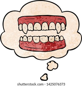 cartoon vampire teeth with thought bubble in grunge texture style