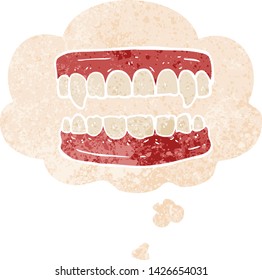 cartoon vampire teeth with thought bubble in grunge distressed retro textured style