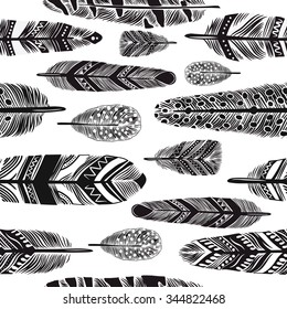Cartoon vector feathers seamless pattern. 