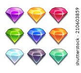 Cartoon vector gems and diamonds icons set in different colors on the white background.