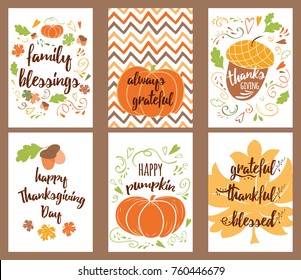 Cartoon vector hand drawn Doodle Happy Thanksgiving Day cards. Vertical banners design templates set with pumpkin, maple leaves, oak for invitation or congratulation design made in fall colors