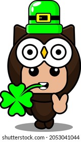 cartoon vector illustration of cute owl animal mascot costume character with st patrick's hat and biting clover