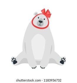 Cartoon vector illustration of cute polar bear with red gift bow and ribbon on its head, isolated on white background. Template for print.
